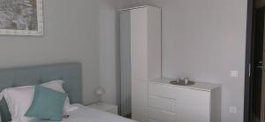 Postel nebo postele na pokoji v ubytování Apartmenthaus Oborishte - 17 + 1 fotografie