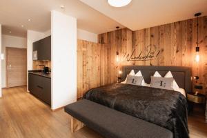 Das Liftplatzl房間的床 +110 張相片