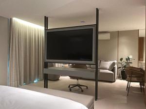 Cama ou camas em um quarto em Jade Hotel Brasília
