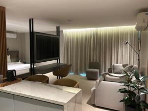 Uma área de estar em Jade Hotel Brasília
