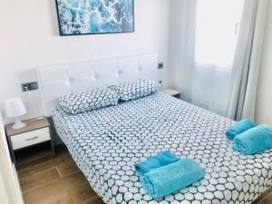 Postel nebo postele na pokoji v ubytování Apartamento playa