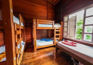 Postel nebo postele na pokoji v ubytování Woods Hostel + 37 fotografií