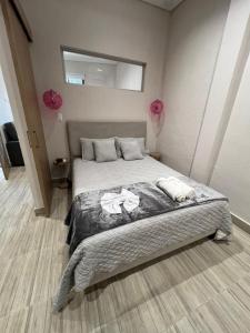 Voodi või voodid majutusasutuse Zentrico Boutique toas