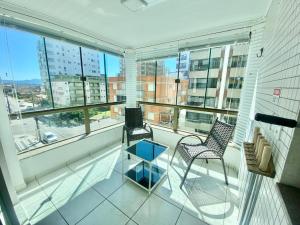 Posezení v ubytování ap de frente, sacada, 3 splits, wi-fi