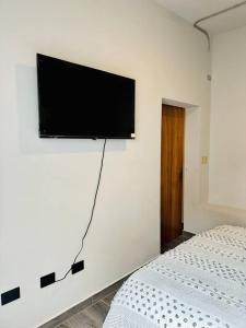 TV a/nebo společenská místnost v ubytování Malecon NEW Casita Victoria