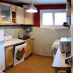 Kuchyň nebo kuchyňský kout v ubytování Résidence Canteneige - Appartement 7 couchages vue dégagée et proche départ télésiège MAE-9791 + 2 fotografie