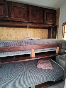 two bunk beds in a room with at Résidence Gaubert - Mignon petit studio 4 couchages à Vars MAE-9981 in Vars +4 photos