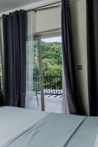 Postel nebo postele na pokoji v ubytování Casa Palmera