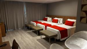 Cama ou camas em um quarto em Jade Hotel Brasília