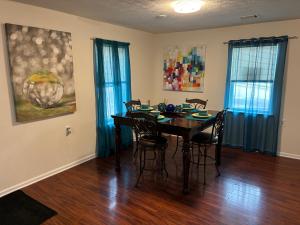 a dining room with a table and chairs at Atlanta Quiet Private Room 2 in Atlanta