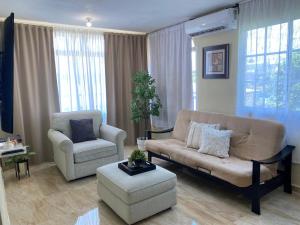 Posezení v ubytování Luxury Apartment By Merengue House
