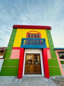 a brightly colored building with a colorful front at El Caminito in São Borja