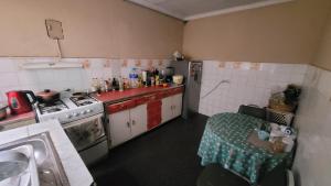 Kuchyň nebo kuchyňský kout v ubytování Casa de Viajeros