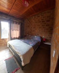Postel nebo postele na pokoji v ubytování Casa 2 dormitorios B