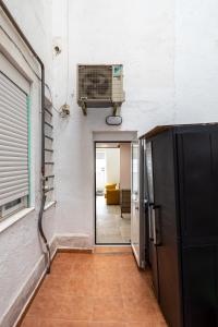 Televízia a/alebo spoločenská miestnosť v ubytovaní Galileo apartment