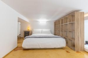 Posteľ alebo postele v izbe v ubytovaní Galileo apartment