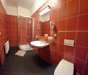 Koupelna v ubytování neVINNÉ Apartmány