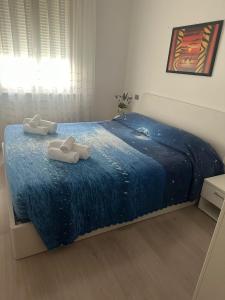 Postel nebo postele na pokoji v ubytování Appartamento Planet