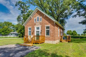 a red brick house with a large yard at West Lafayette Home about 3 Mi to Purdue Campus! in West Lafayette