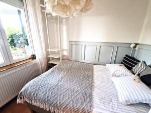 A bed or beds in a room at Gellért Hill Apartment