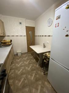 Η κουζίνα ή μικρή κουζίνα στο City House +3 φωτογραφίες