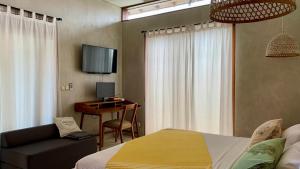 Μια τηλεόραση ή/και κέντρο ψυχαγωγίας στο Private Bali Villa - Pool & Ricefield View