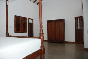 Letto o letti in una camera di The Mango Nest