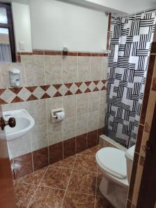 Koupelna v ubytování Conquistador Hotel