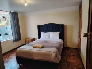 Postel nebo postele na pokoji v ubytování Conquistador Hotel