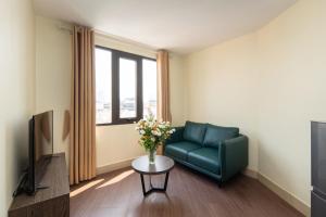 Μια τηλεόραση ή/και κέντρο ψυχαγωγίας στο Granda Hanoi Hotel & Apartment +8 φωτογραφίες