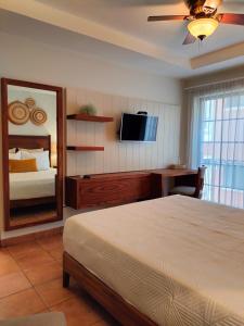Postel nebo postele na pokoji v ubytování HOTEL COLLI