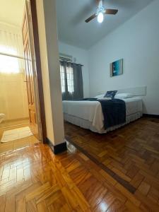 En eller flere senge i et værelse på Hotel Itapetininga