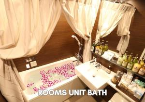 Vonios kambarys apgyvendinimo įstaigoje HOTEL PetitBali Higashi-Shinjuku
