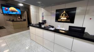 Kuchyň nebo kuchyňský kout v ubytování Hotel AL Amin By Ahmed