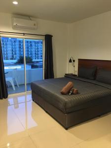 Katil atau katil-katil dalam bilik di Smart Place Pattaya