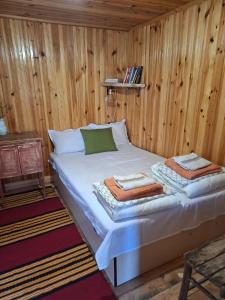 Postel nebo postele na pokoji v ubytování Ecopark Sadzhaka