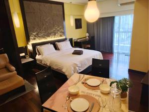Suite @ Sunway Pyramid Mall客房内的一张或多张床位