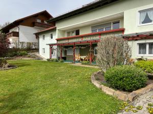 En have udenfor Das Nistkästchen