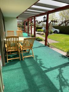 En have udenfor Das Nistkästchen + 2 billeder