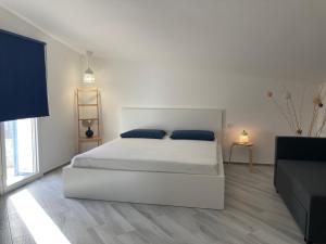 Posteľ alebo postele v izbe v ubytovaní Le case di Fiò