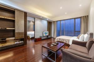 TV a/nebo společenská místnost v ubytování Guangzhou City Inn Hotel Apartment Pazhou