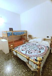 Postel nebo postele na pokoji v ubytování Casa con giardino vicina a tutto + 8 fotografií