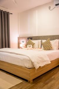 Letto o letti in una camera di Holiday Crib