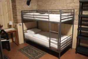 Letto o letti in una camera di Alba Hostel