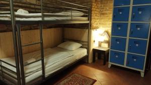 Letto o letti in una camera di Alba Hostel