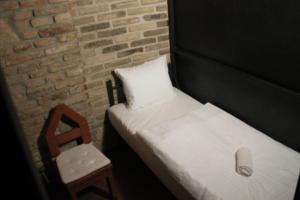 Letto o letti in una camera di Alba Hostel