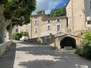 a stone building with a tunnel in front of it at DURANCE 