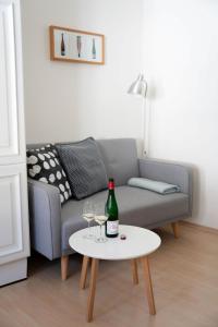 Posezení v ubytování Claes Weinquartier - Appartements & Wein by Niko Schmitt