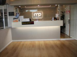 a store with a sign that reads private paparazzo shop at Marco Polo Motor Inn Sydney Hotel in Sydney