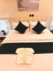 Krevet ili kreveti u jedinici u okviru objekta Tranquil Oasis Hotel